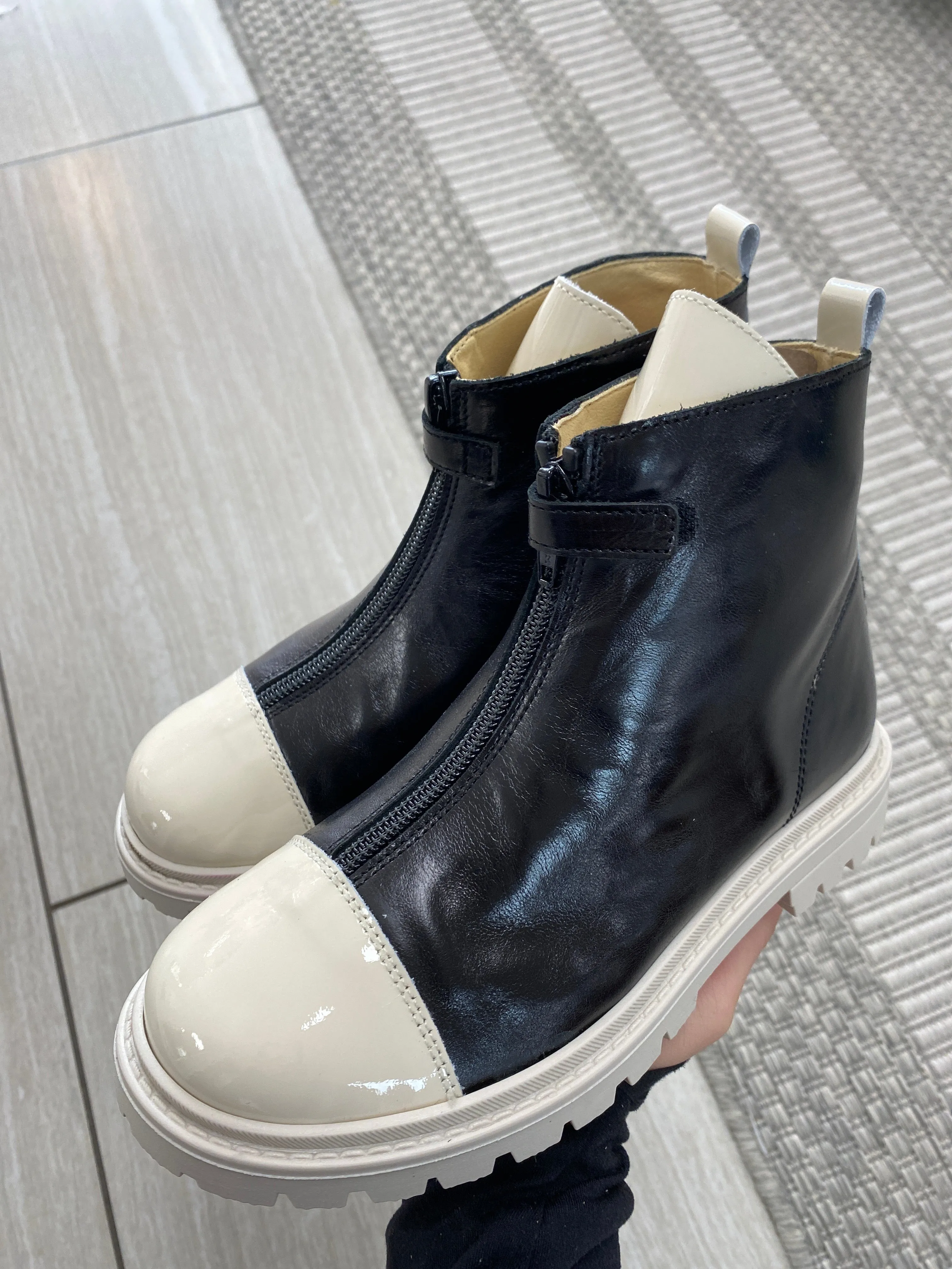 Andanines Black and White Captoe Zipper Bootie